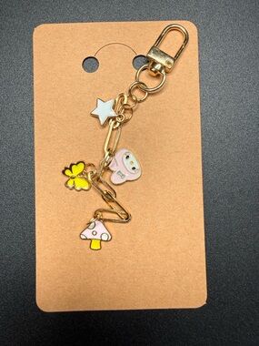 Sanrio themed gold tone keychain